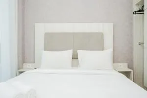 Comfy and Minimalist Studio Apartment at Tree Park City BSD By Travelio - Dadap