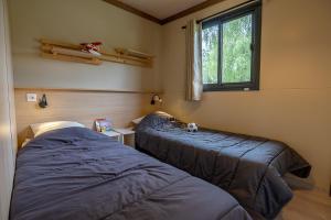 Campings Camping Les Ballastieres - Vosges du Sud : photos des chambres
