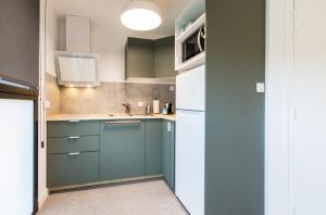 Appartements Hoedic - studio lumineux : photos des chambres