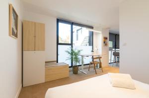 Appartements Hoedic - studio lumineux : photos des chambres