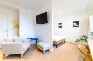 Appartements Hoedic - studio lumineux : photos des chambres