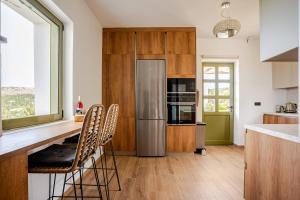 Villa Anthos - Superb panoramic sea and hill views with private pool