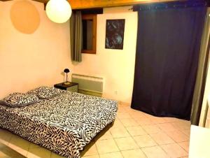 Appartements Charmant studio : photos des chambres