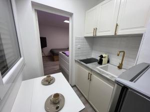 Appartements Appartement avec jacuzzi proche du centre : photos des chambres