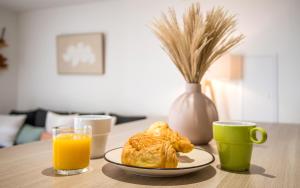 Appartements Le Cocon Ruthenois - Climatisation, Wifi, Netflix & Jardin : photos des chambres