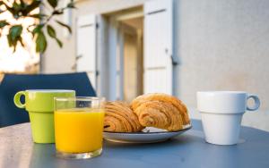 Appartements Le Cocon Ruthenois - Climatisation, Wifi, Netflix & Jardin : photos des chambres