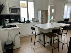 Appartements Espace ouvert et lumineux : photos des chambres