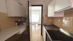 Marcelli, trilocale con terrazzo in residence con piscina - M398