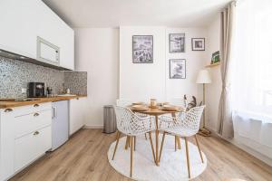 Appartements La Suite Fontaine : photos des chambres