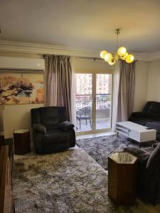 Entire 3BDR apartment at prime location with wifi and garden view near CAI airport