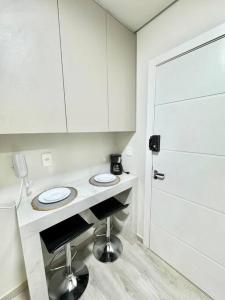 Loft confortável e refinado A