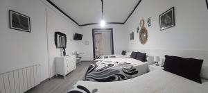 Quadruple Room room in Hostal Loyola