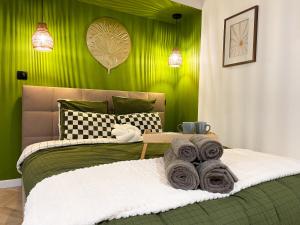 Appartements Suite Emeraude centre ville : photos des chambres