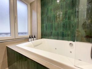 Appartements Suite Emeraude centre ville : photos des chambres