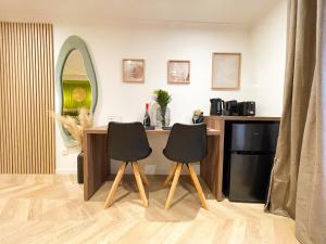 Appartements Suite Emeraude centre ville : photos des chambres