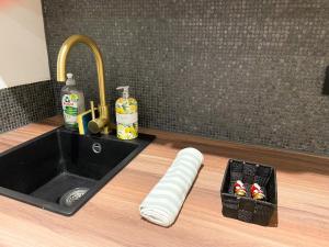 Appartements Suite Emeraude centre ville : photos des chambres