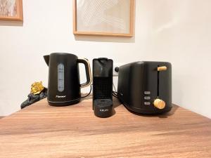 Appartements Suite Emeraude centre ville : photos des chambres