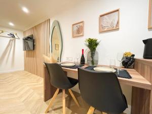 Appartements Suite Emeraude centre ville : photos des chambres