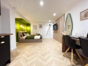 Appartements Suite Emeraude centre ville : photos des chambres