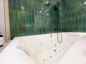 Appartements Suite Emeraude centre ville : photos des chambres