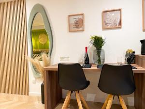 Appartements Suite Emeraude centre ville : photos des chambres