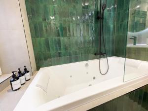 Appartements Suite Emeraude centre ville : photos des chambres