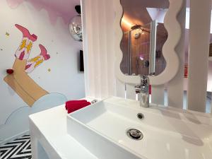 Appartements Chambre Disco Paradisio : photos des chambres