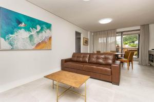 Porto Madero 105 – Apartamento Moderno em Condomínio com Piscina e Academia no Rooftop no Centro de Bombinhas.