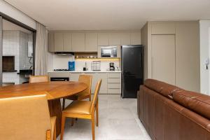 Porto Madero 105 – Apartamento Moderno em Condomínio com Piscina e Academia no Rooftop no Centro de Bombinhas.