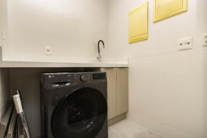 Porto Madero 105 – Apartamento Moderno em Condomínio com Piscina e Academia no Rooftop no Centro de Bombinhas.