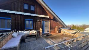 Ferienwohnung mit sonniger Dachterrasse am Pferdehof