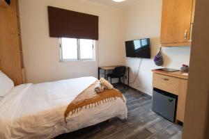 Encantador estudio privado con baño y kitchenette