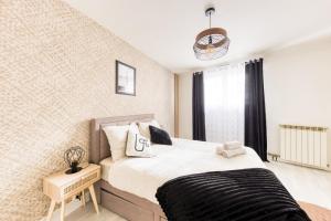 Appartements Appartement paisible proche Paris - Metro 11 : photos des chambres