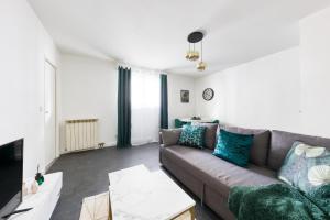 Appartements Appartement paisible proche Paris - Metro 11 : photos des chambres