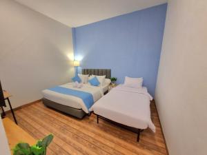 Zizi Homey 302 Cemara Asri