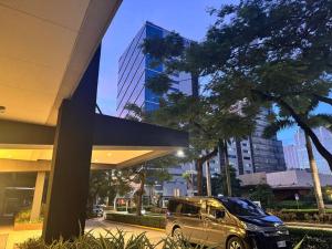 Condo at Avida Towers Riala T2 Bright, Cozy Studio with a Touch of Nature