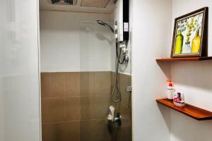 Condo at Avida Towers Riala T2 Bright, Cozy Studio with a Touch of Nature