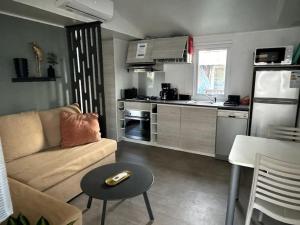 Maisons de vacances Joli Bungalow 464 pour 4-6 pers Camping Siblu Lac des Reves Lattes : photos des chambres