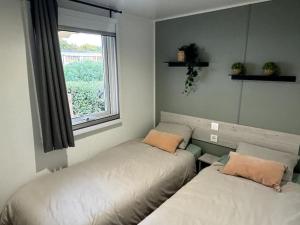 Maisons de vacances Joli Bungalow 464 pour 4-6 pers Camping Siblu Lac des Reves Lattes : photos des chambres