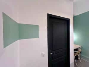 Appartements LE MONTAIGNE - Wifi fibre- Coeur du centre ville-PROPERTY RENTAL NM : photos des chambres