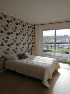 Appartements Grand appartement avec vue - Plage a pied : photos des chambres
