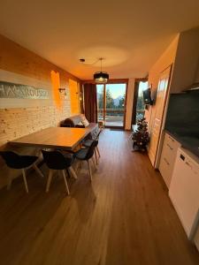 Appartements Le Cocon 4 Saisons - Les Villages du Bachat a Chamrousse 1700 - Droseras A14 - Classe 3 etoiles : photos des chambres