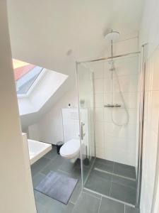 Charmantes Studio-Apartment im Herzen von Neureut - Fußbodenheizung, Regendusche, Waschmaschine, Stellplatz