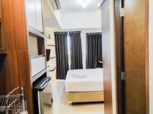 Homey and Comfy Studio at Vida View Makasar Apartment By Travelio