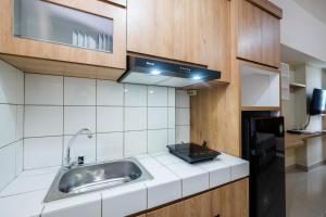 Comfort and Strategic Studio at Springlake Summarecon Bekasi Apartment By Travelio