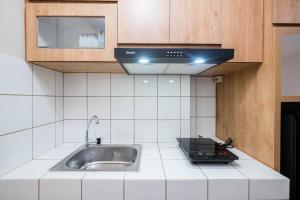 Comfort and Strategic Studio at Springlake Summarecon Bekasi Apartment By Travelio