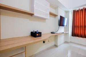 Comfort and Strategic Studio at Springlake Summarecon Bekasi Apartment By Travelio
