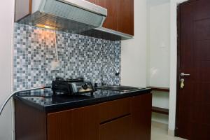 Modern and Comfy Studio at Grand Dhika City Apartment By Travelio
