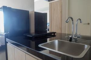 Restful Studio Apartment at Orchard Supermall Mansion By Travelio