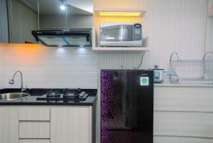 Best Studio with Pool View Springlake Summarecon Apartment By Travelio